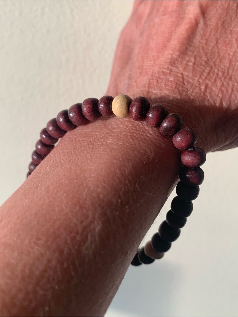 Handmade Burgundy Wood Bead Bracelet with Natural Accent